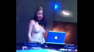 Topless dj mixes in some porn